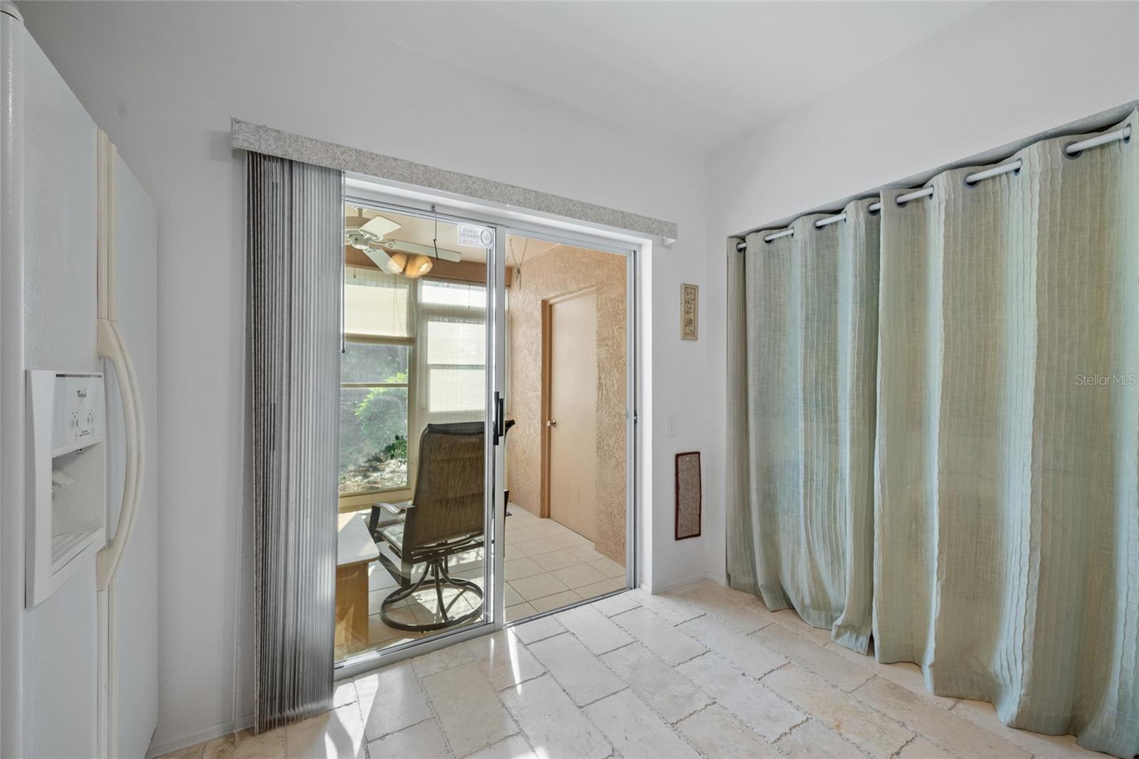 Kitchen ~ Sliding Doors to Screened Outdoor Patio