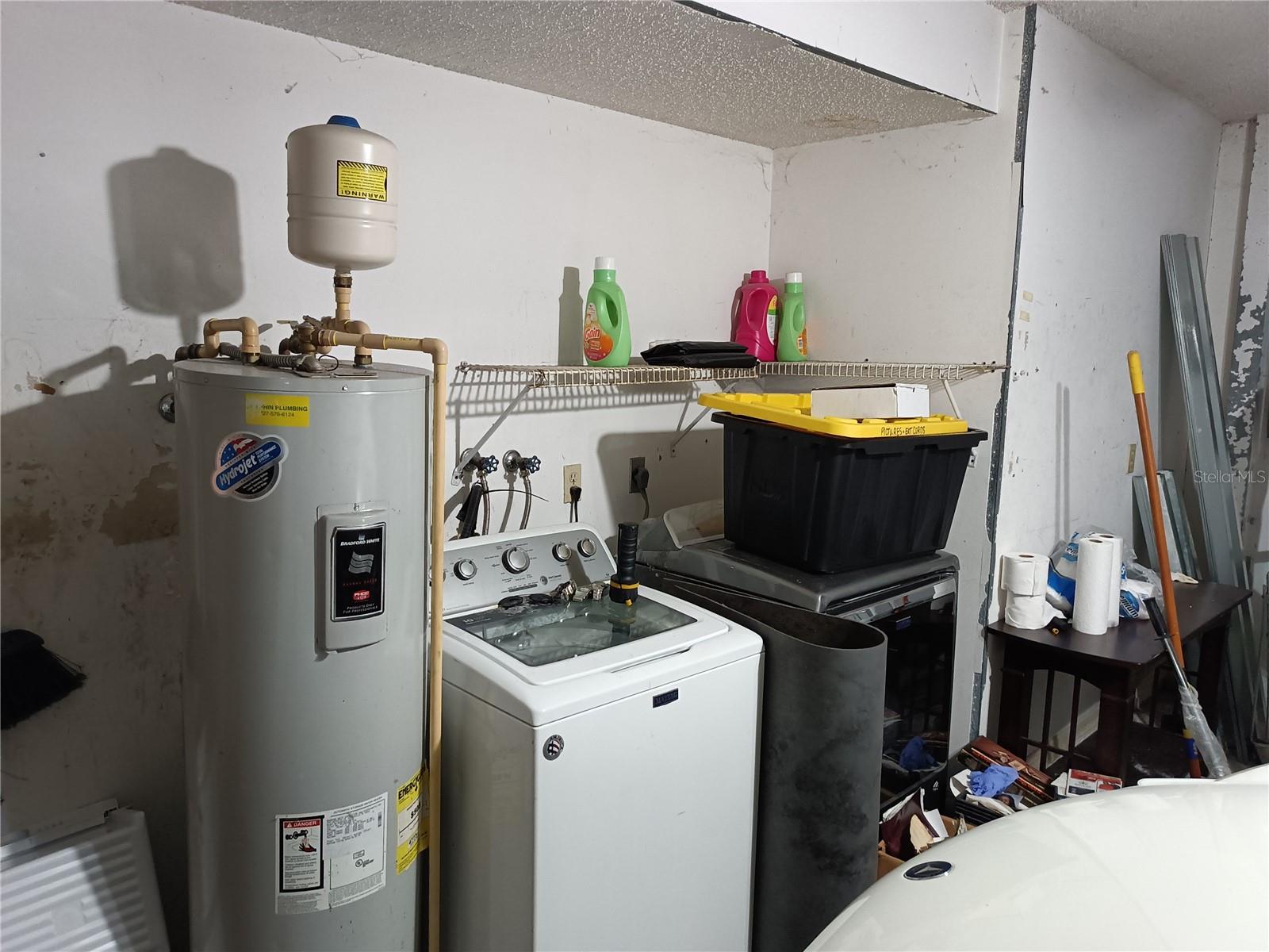 Laundry/hot water heater in garage