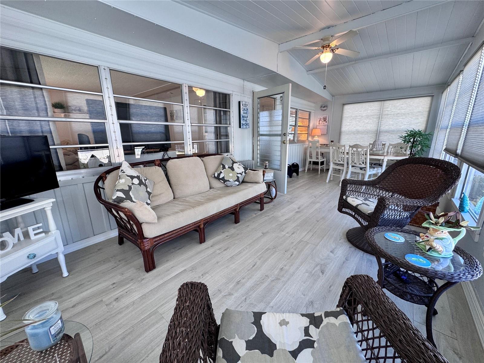 Sunroom gives extra room for entertaining.