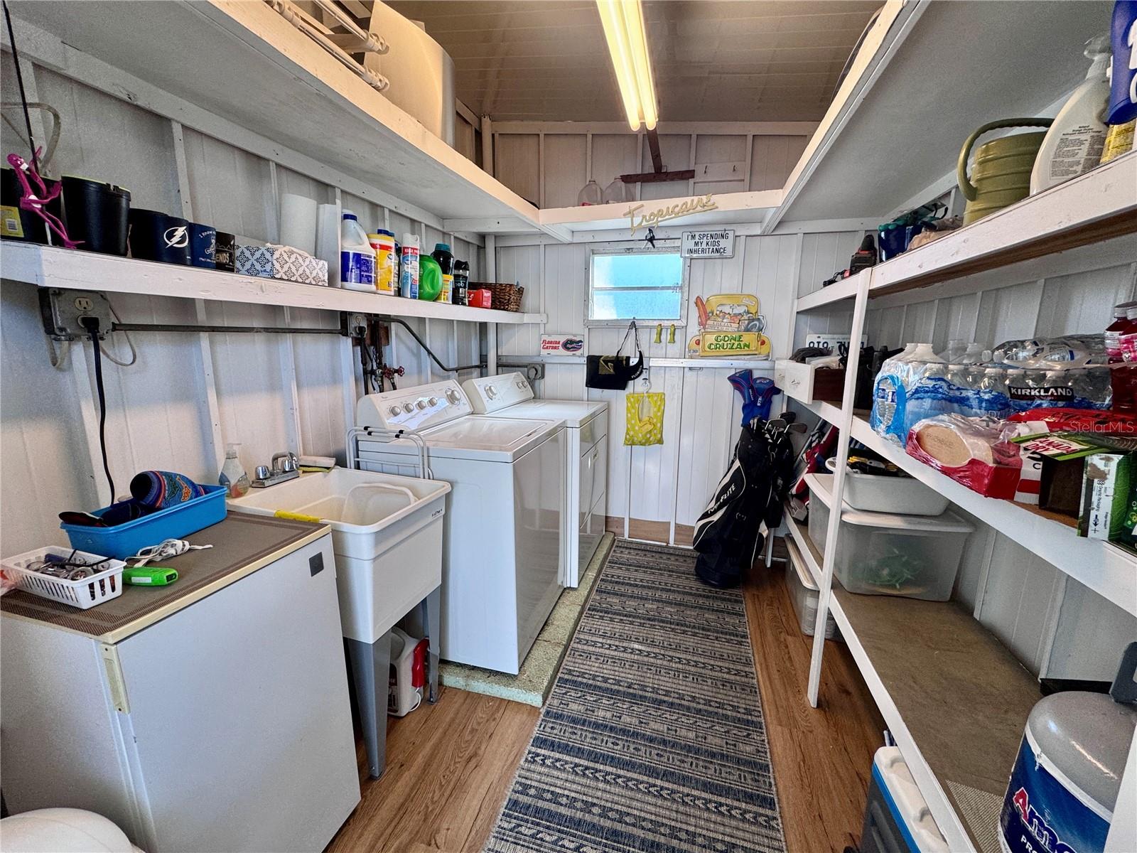 Storage shed located on the carport.