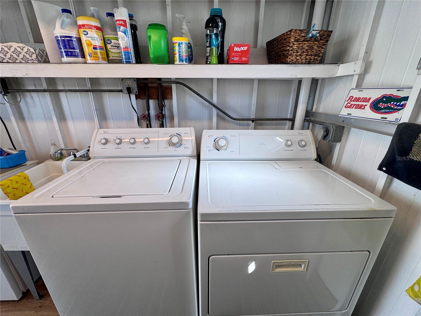 Laundry Located in the shed off the carport.