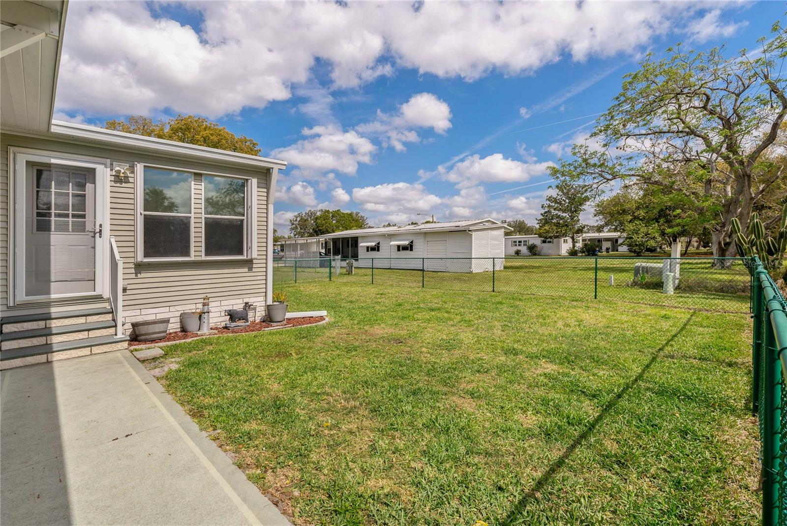 ENJOY YOUR HUGE AND FULLY FENCED IN BACKYARD