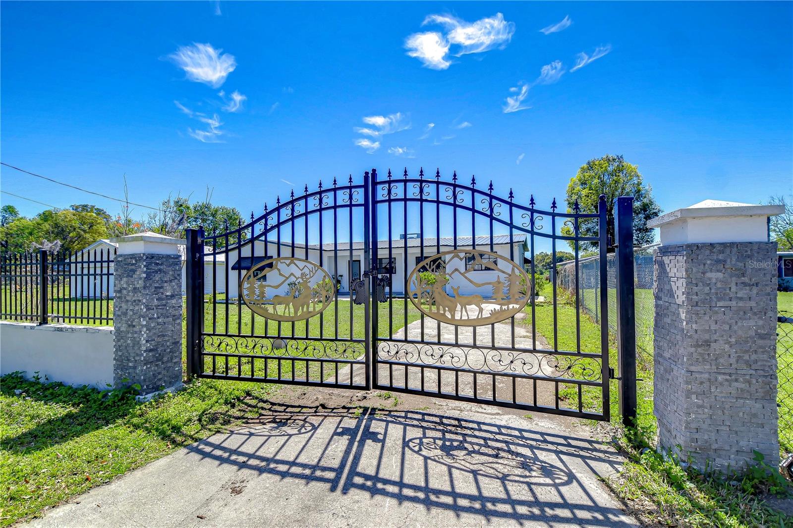 The captivating entrance sets the tone for a home that promises both privacy and a touch of luxury.