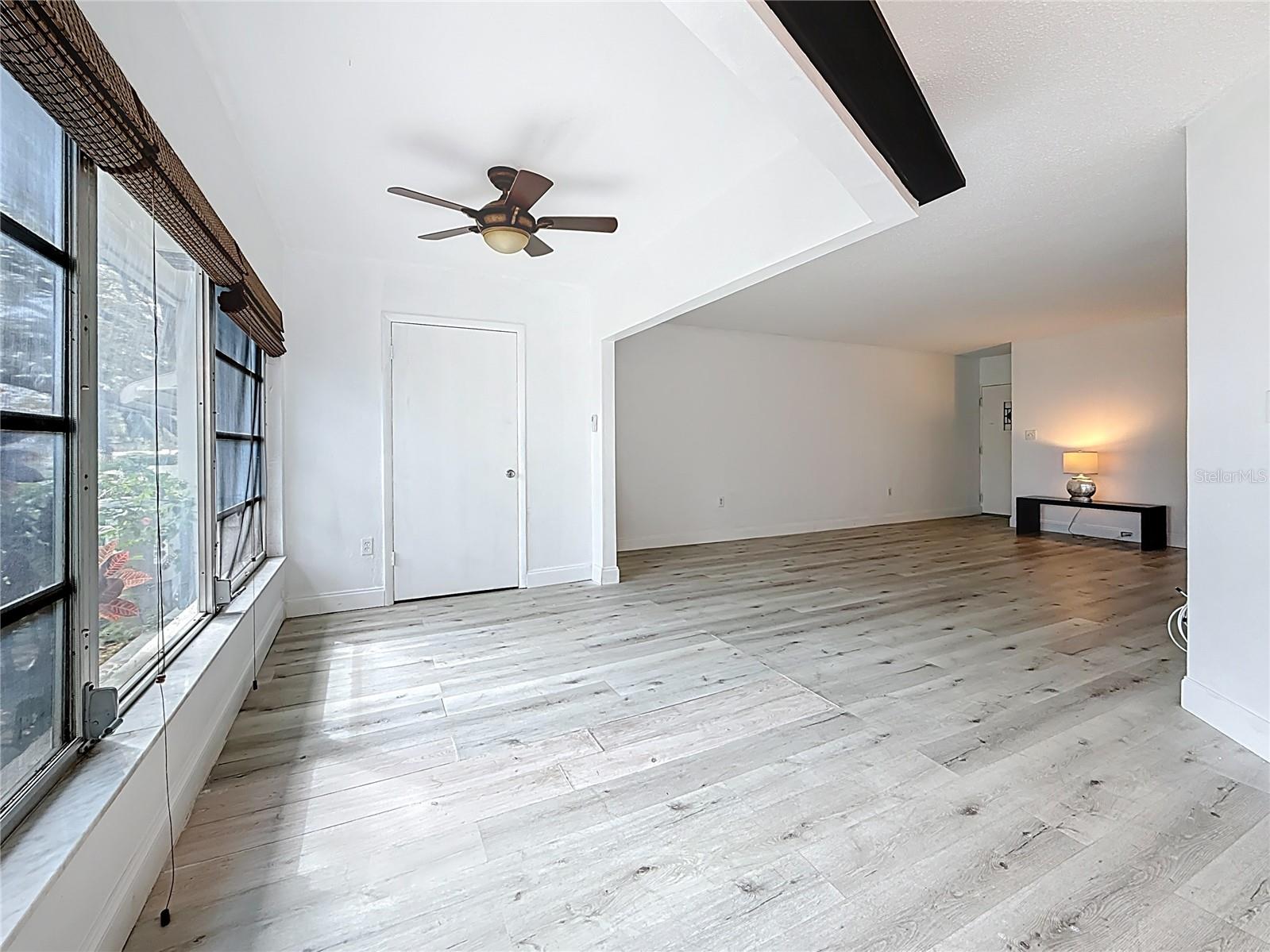 Sitting room, the closet is a large storage closet. Dining area & kitchen are to your right.