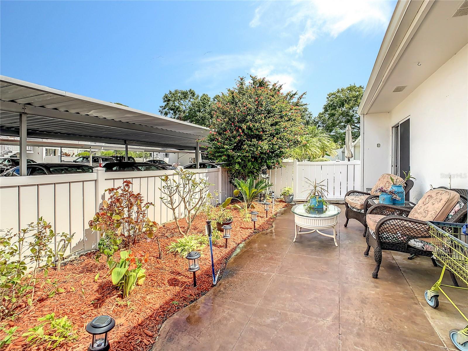 Front porch of villa- sliding door towards the right is primary bedroom.