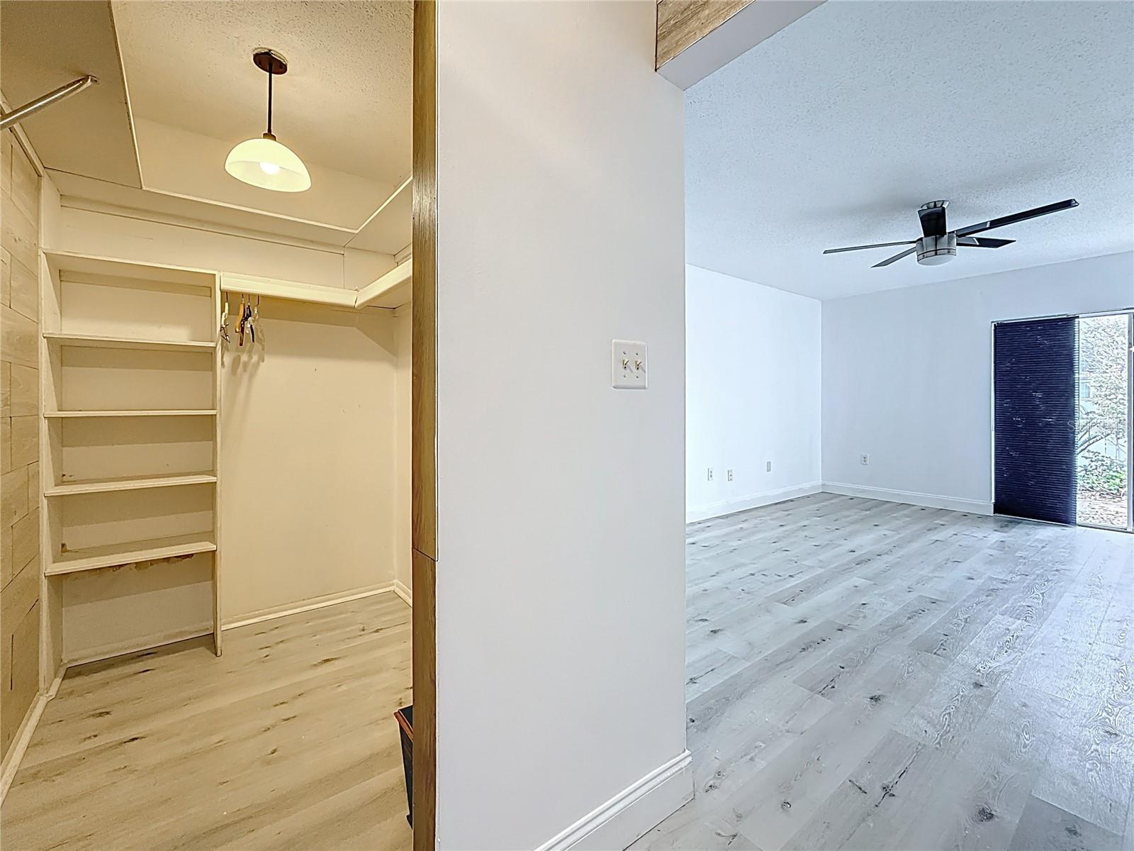 Large walk-in closet in primary bedroom. ( the private water closet is to your left now)