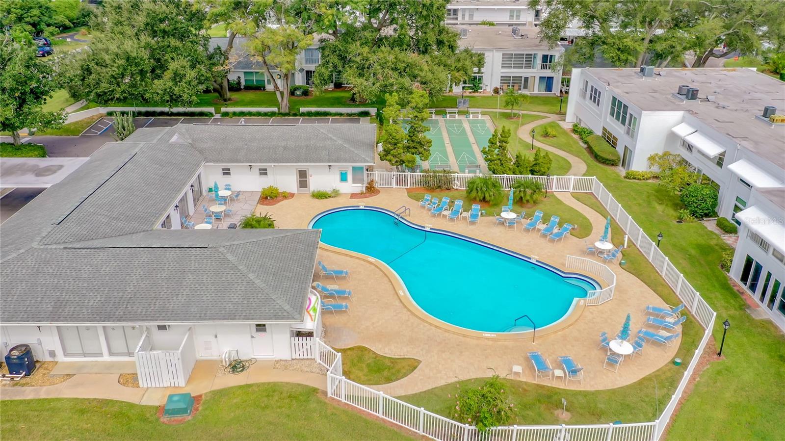 Clubhouse, pool, shuffleboard courts. There are grills available here, too. ( near the center back of the building)