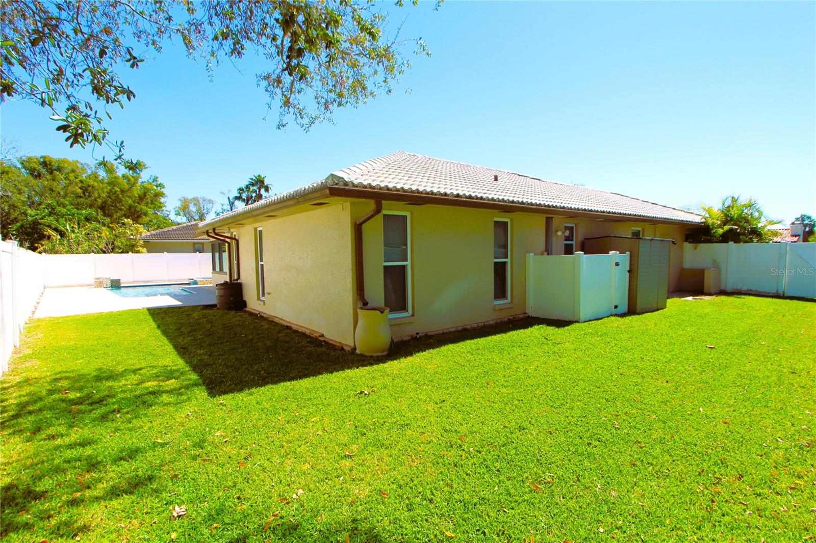 Fully enclosed back and side yards with vinyl fencing for privacy