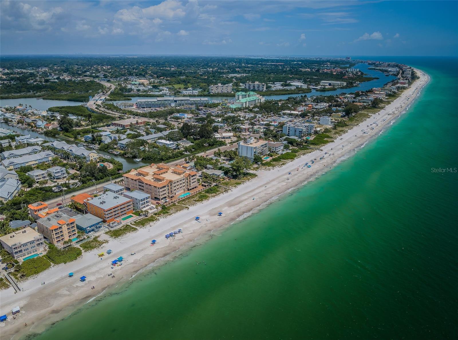 ...Beautiful Aerial of Indian Rocks Beach Looking South.. Miles of Sugar Sand Beaches with Aerial Showcasing the Intracoastal Waterway as Well as the Beaches..  Le Mar Located Bottom Left  in Photo Next to Spotted Orange Roof. Indian Rocks Beach is Home to Splash Harbor Water Park. Great Fun right up the Block.