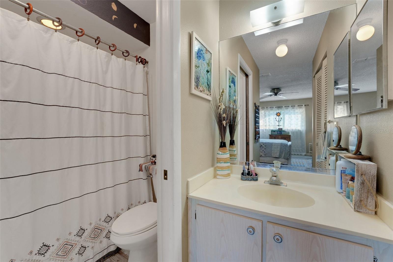 Full bath with walk in shower located within the mater bedroom!