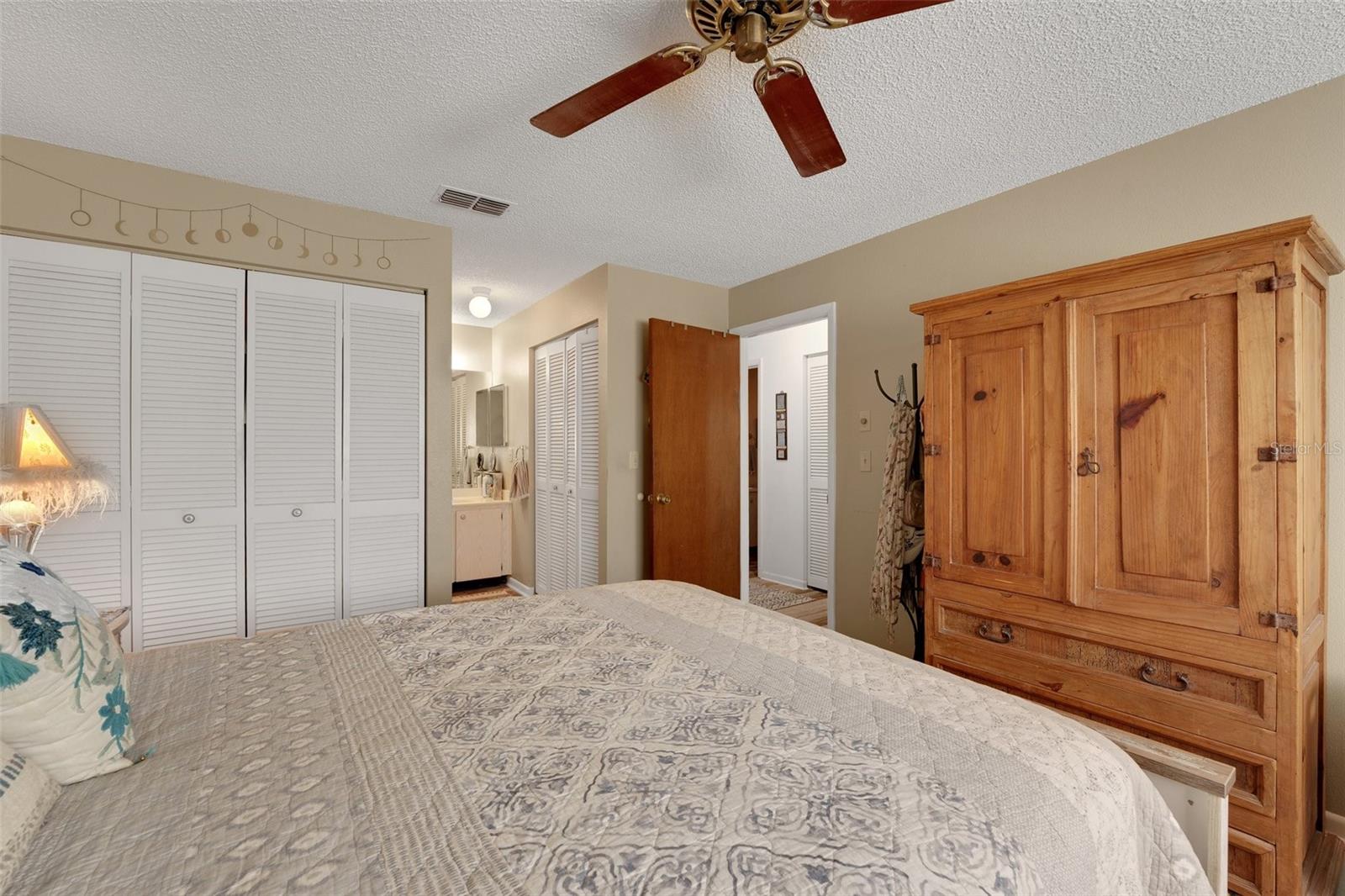 A perfect combination of comfort and convenience: The master bedroom features a private en suite bath just steps away."