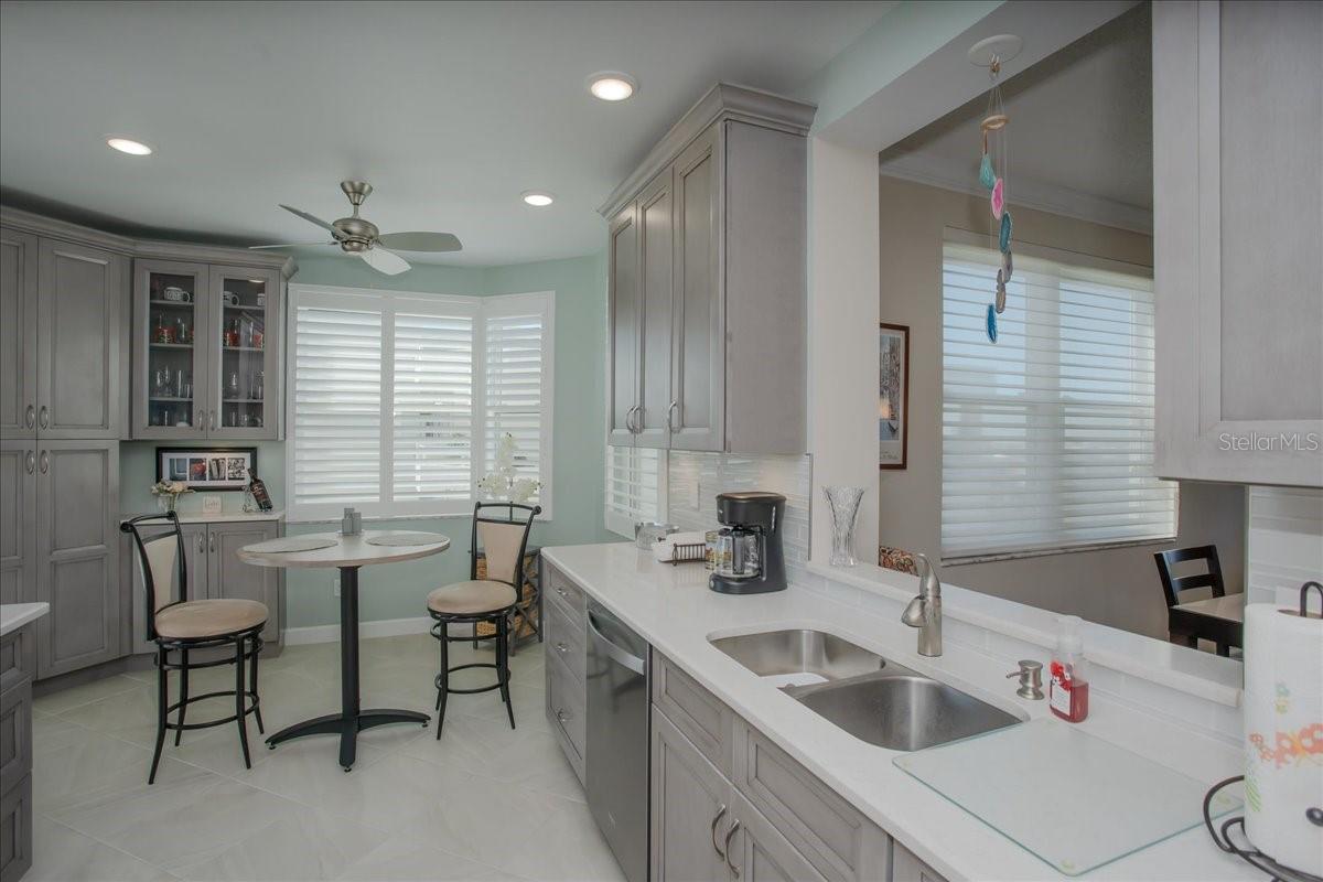 Kitchen has porcelain tile flooring!