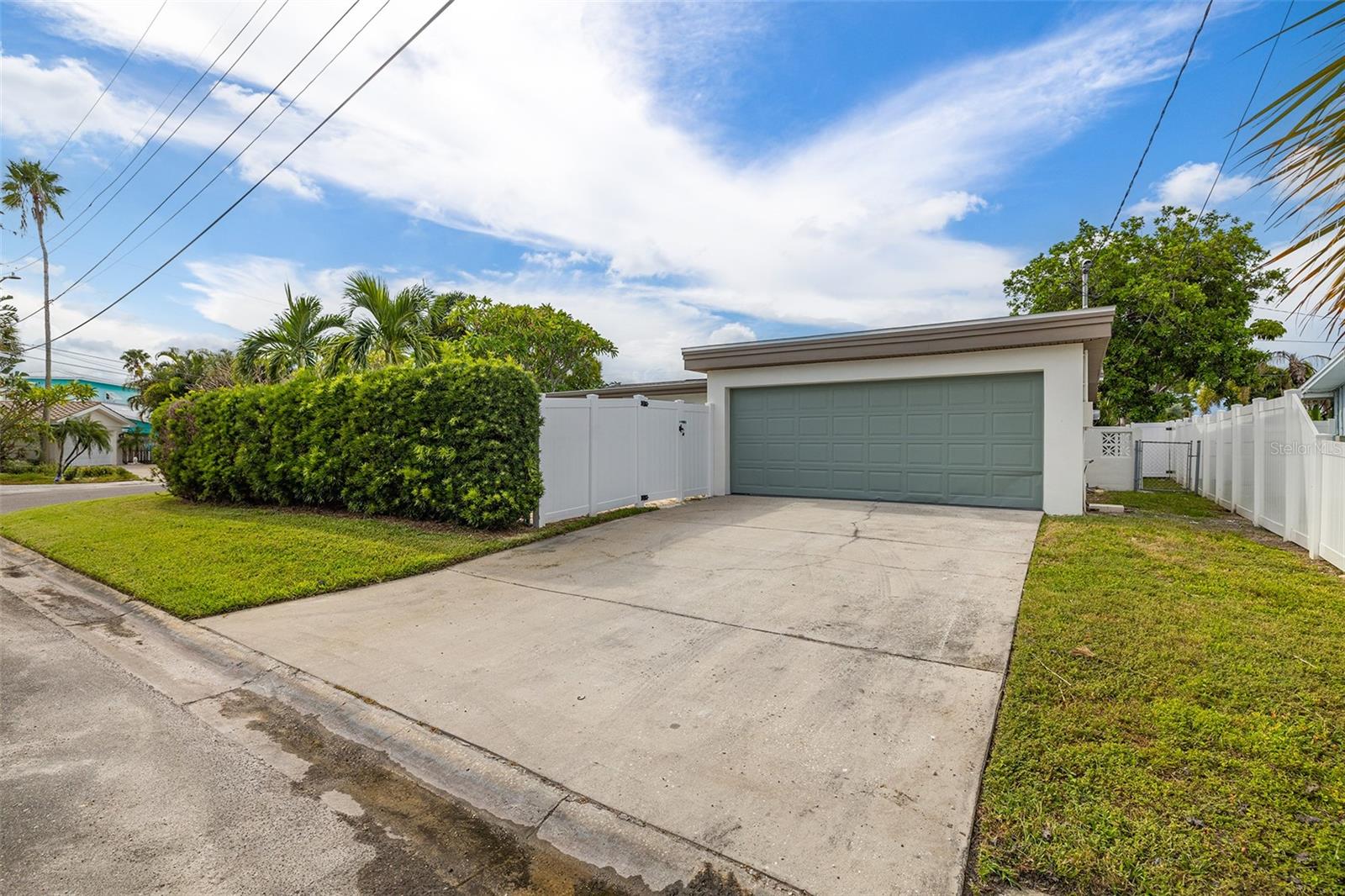 2 car garage with parking pad