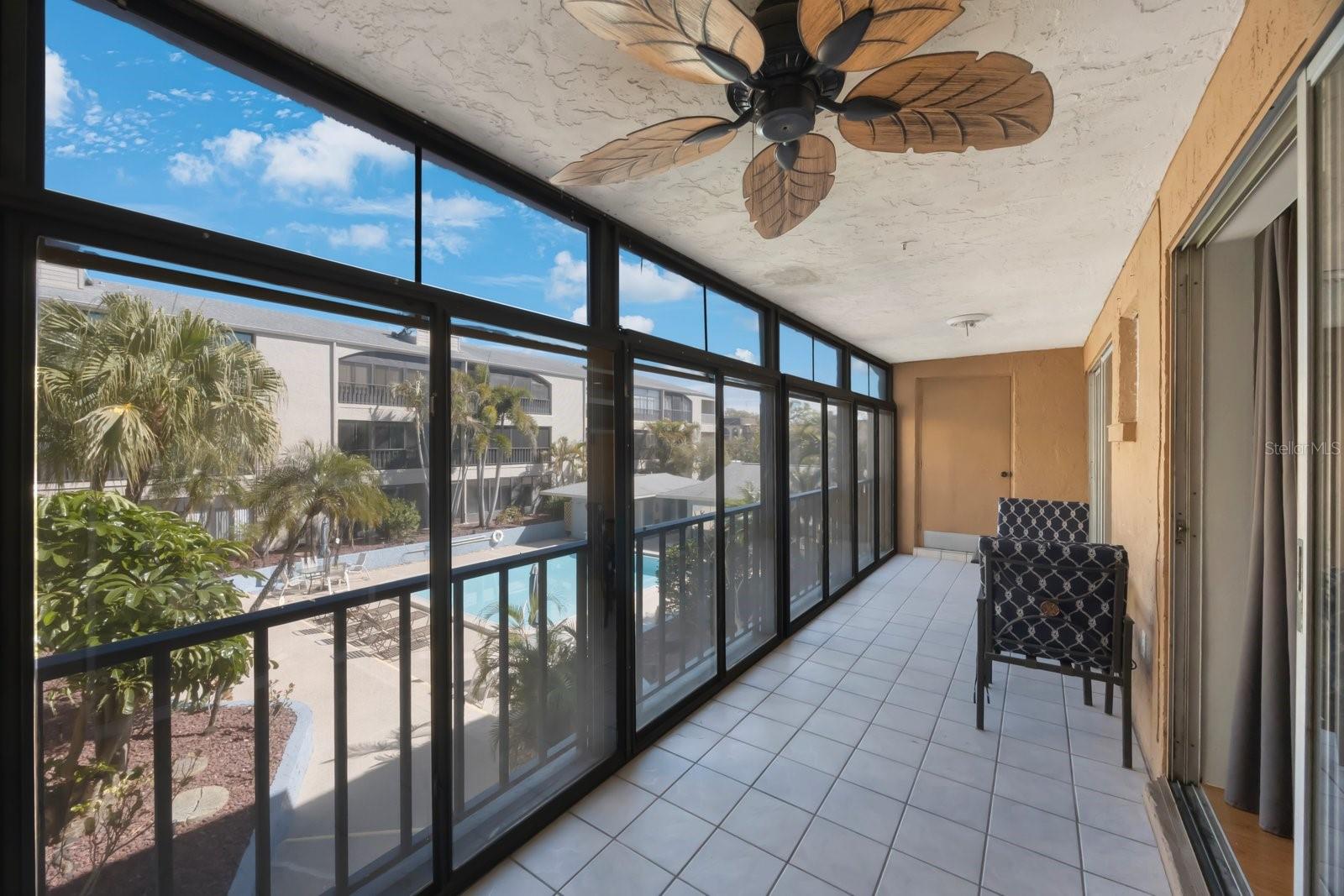 Enclosed Balcony overlooking the Pool