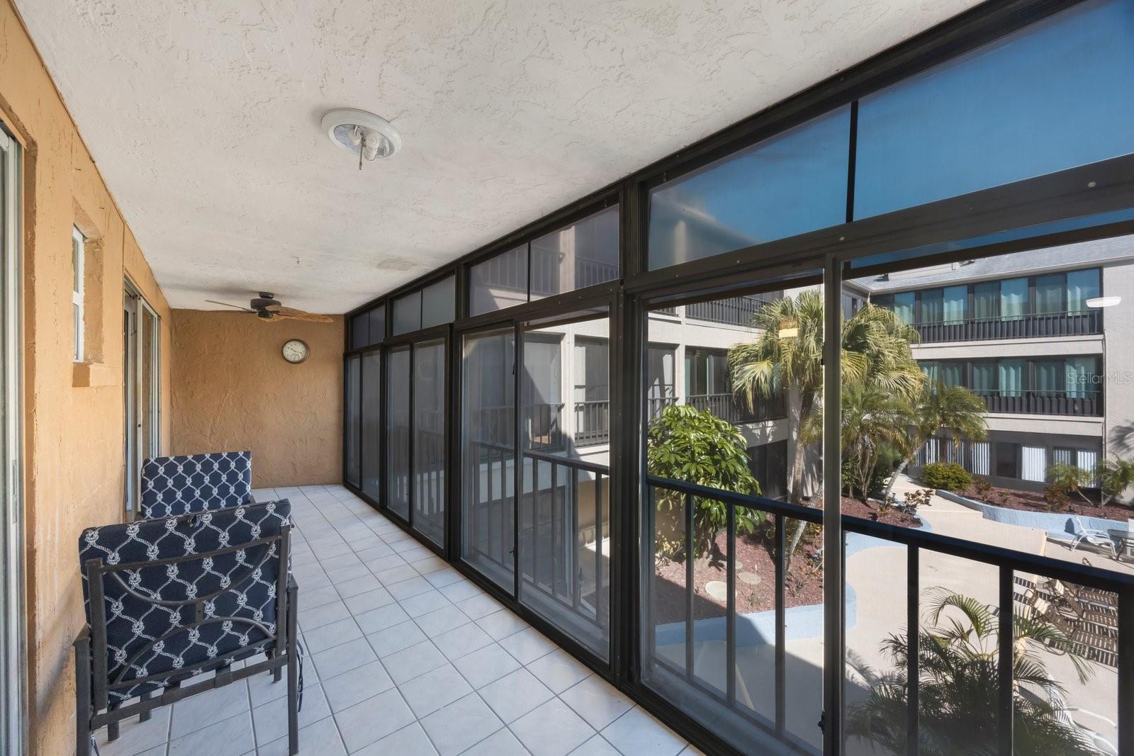 Enclosed Balcony overlooking the Pool