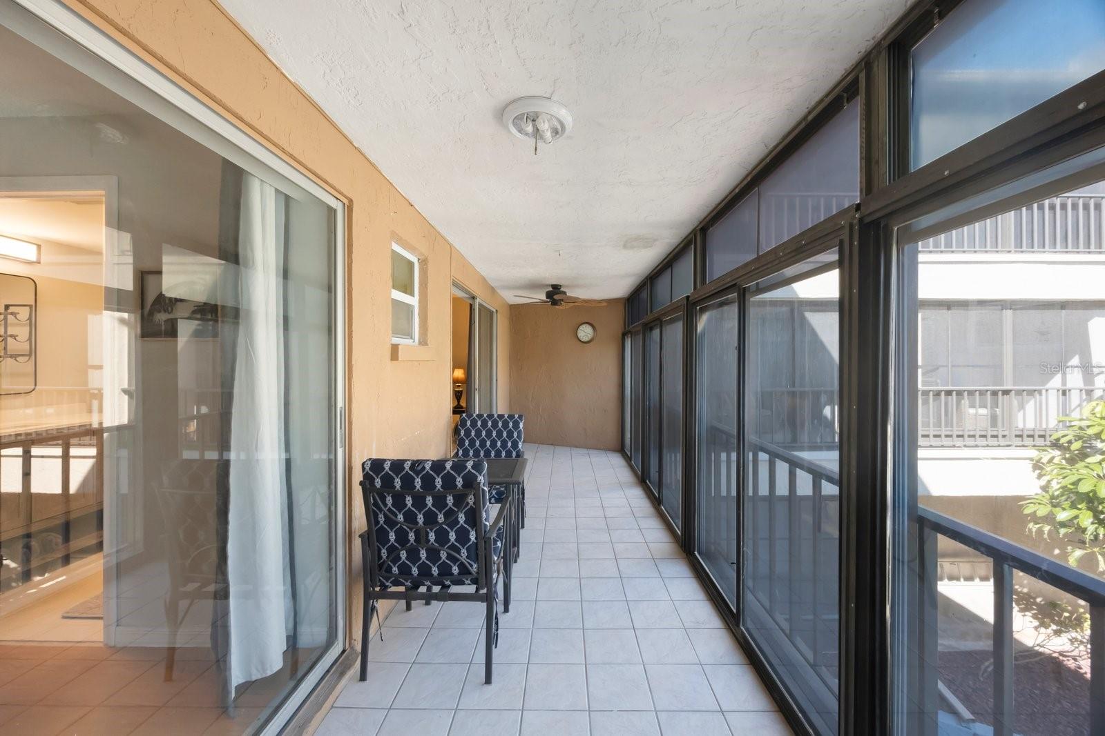 Enclosed Balcony overlooking the Pool