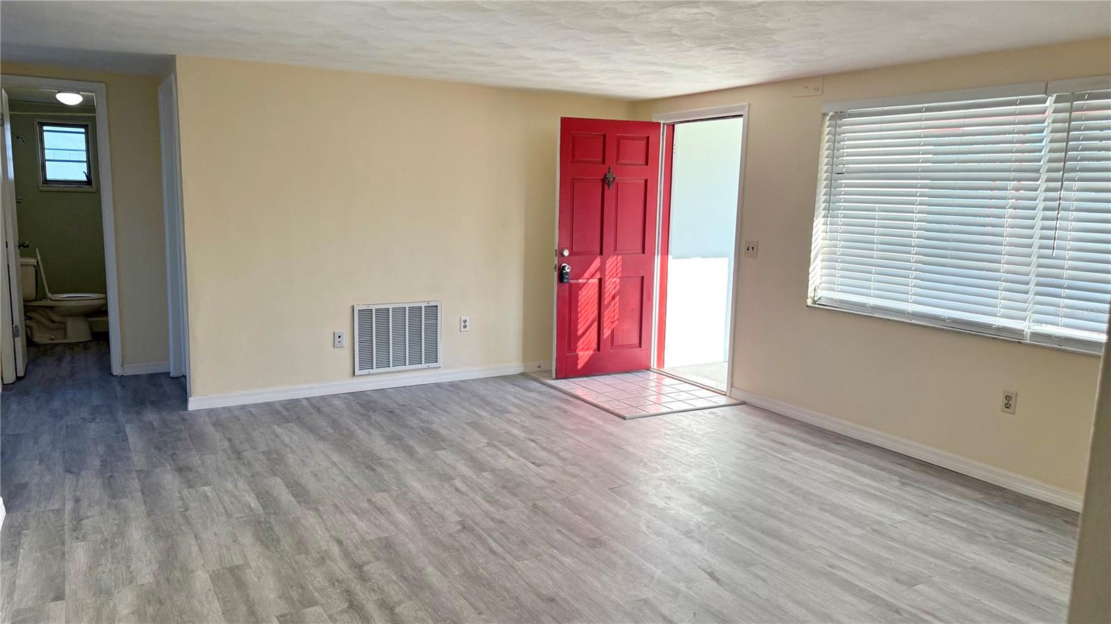 Front Door -- Big Living Room -- 2nd Bathroom