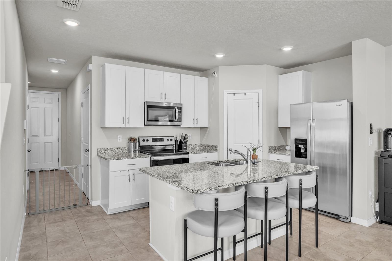 Kitchen with corner walkin pantry