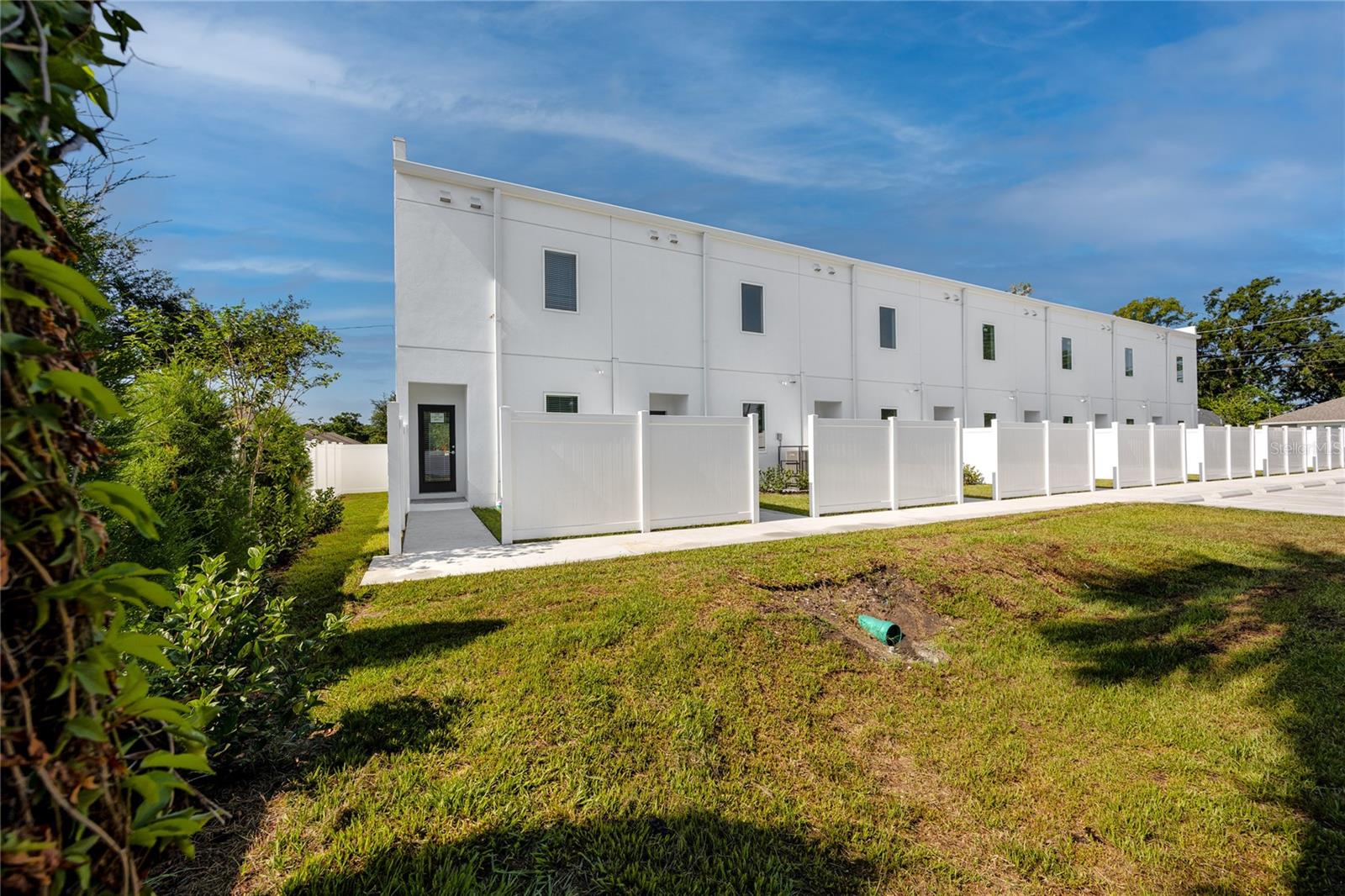 Backside of the 7 unit townhome complex.