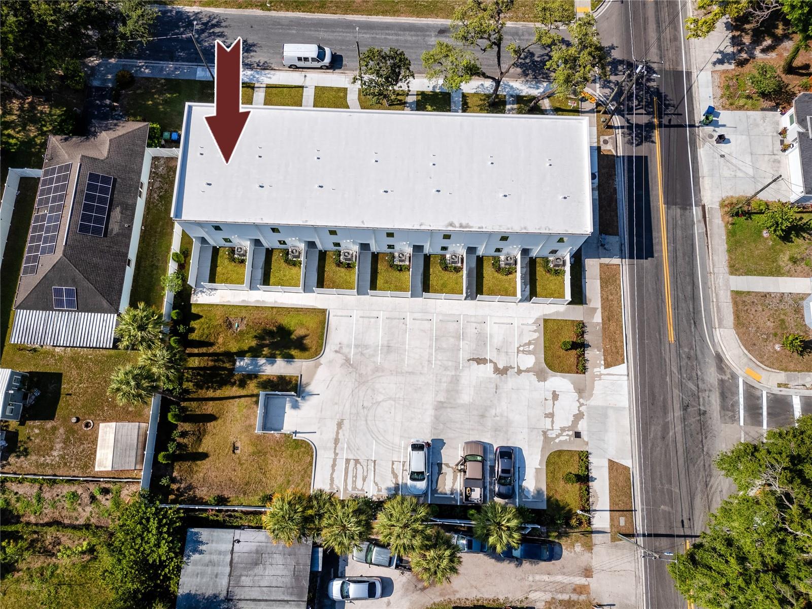 This picture shows the parking pad.  Each owner will get two assigned parking spots.  Street parking is also available in the front of the. home.