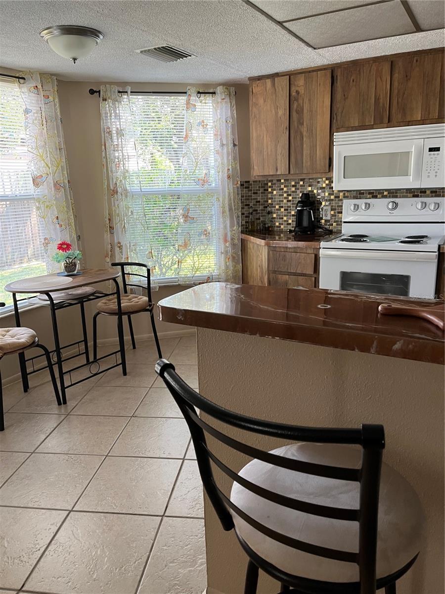 Kitchen breakfast bar and eating area