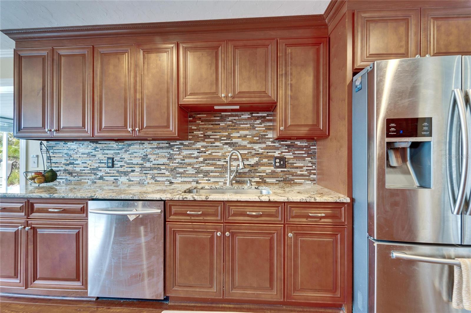 Beautiful tile backsplash and granite countertops