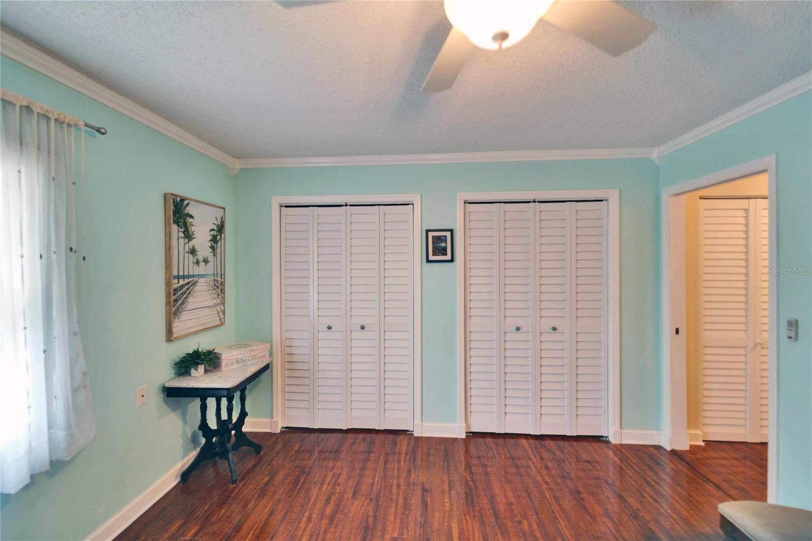 Dual folding doors to large closet in second bedroom