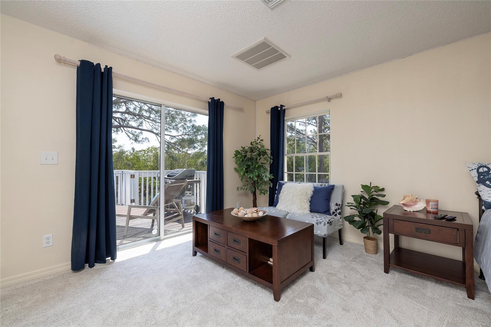 Secondary Master Bedroom with access to pool and sundeck