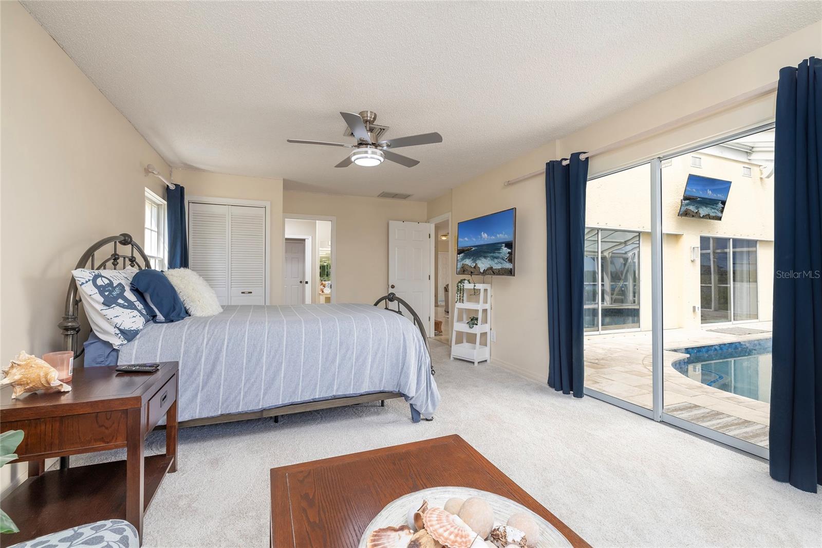 Secondary Master Bedroom with access to pool and sundeck