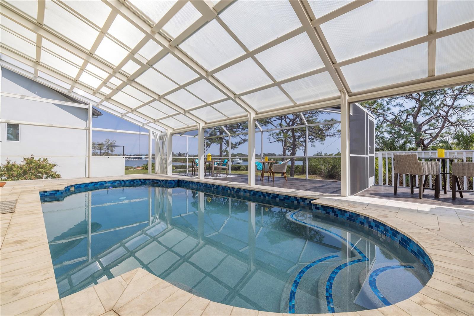 Screened, heated and chilled saltwater pool with beautiful Intracoastal views