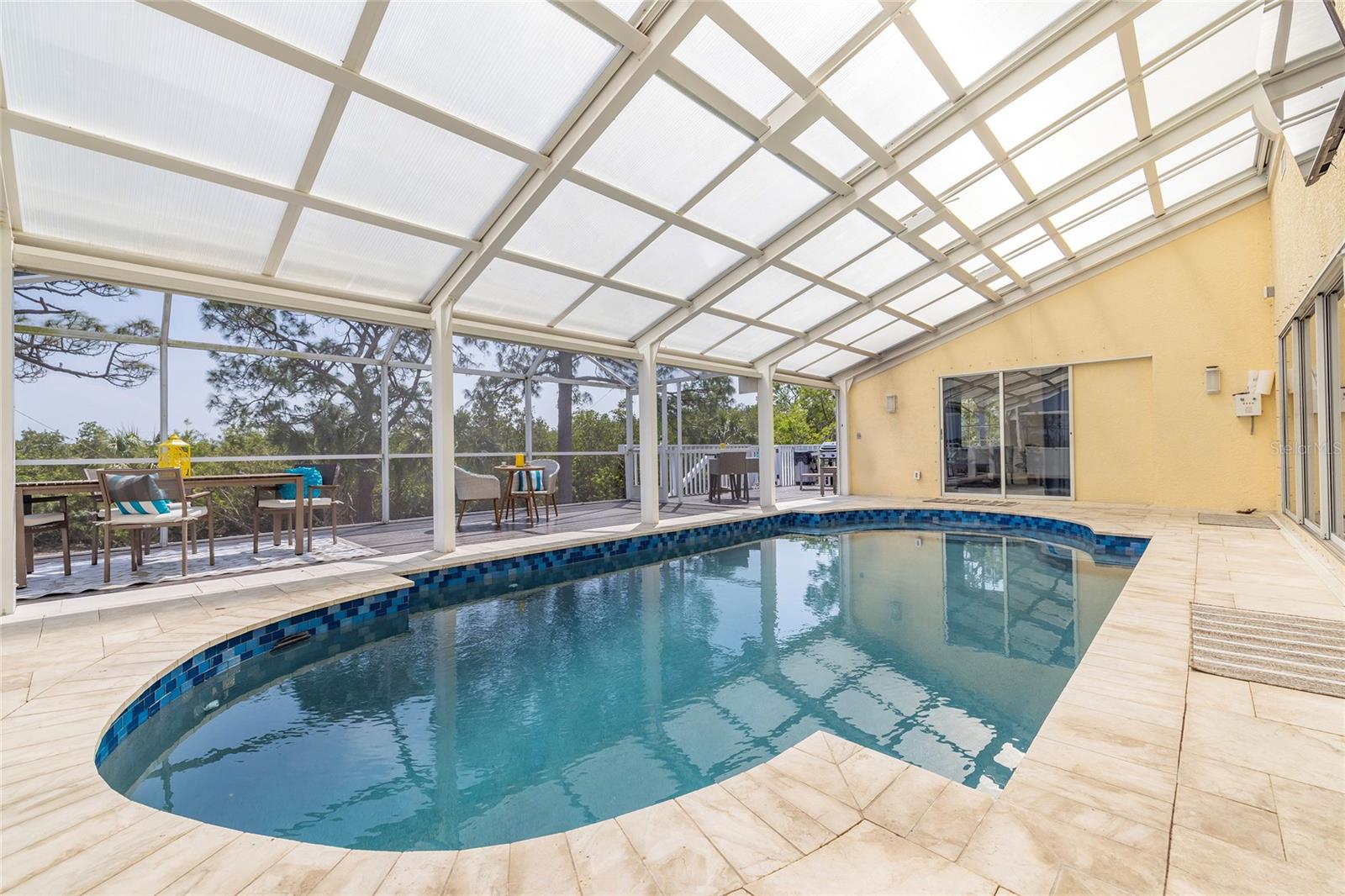 Screened, heated and chilled saltwater pool with beautiful Intracoastal views