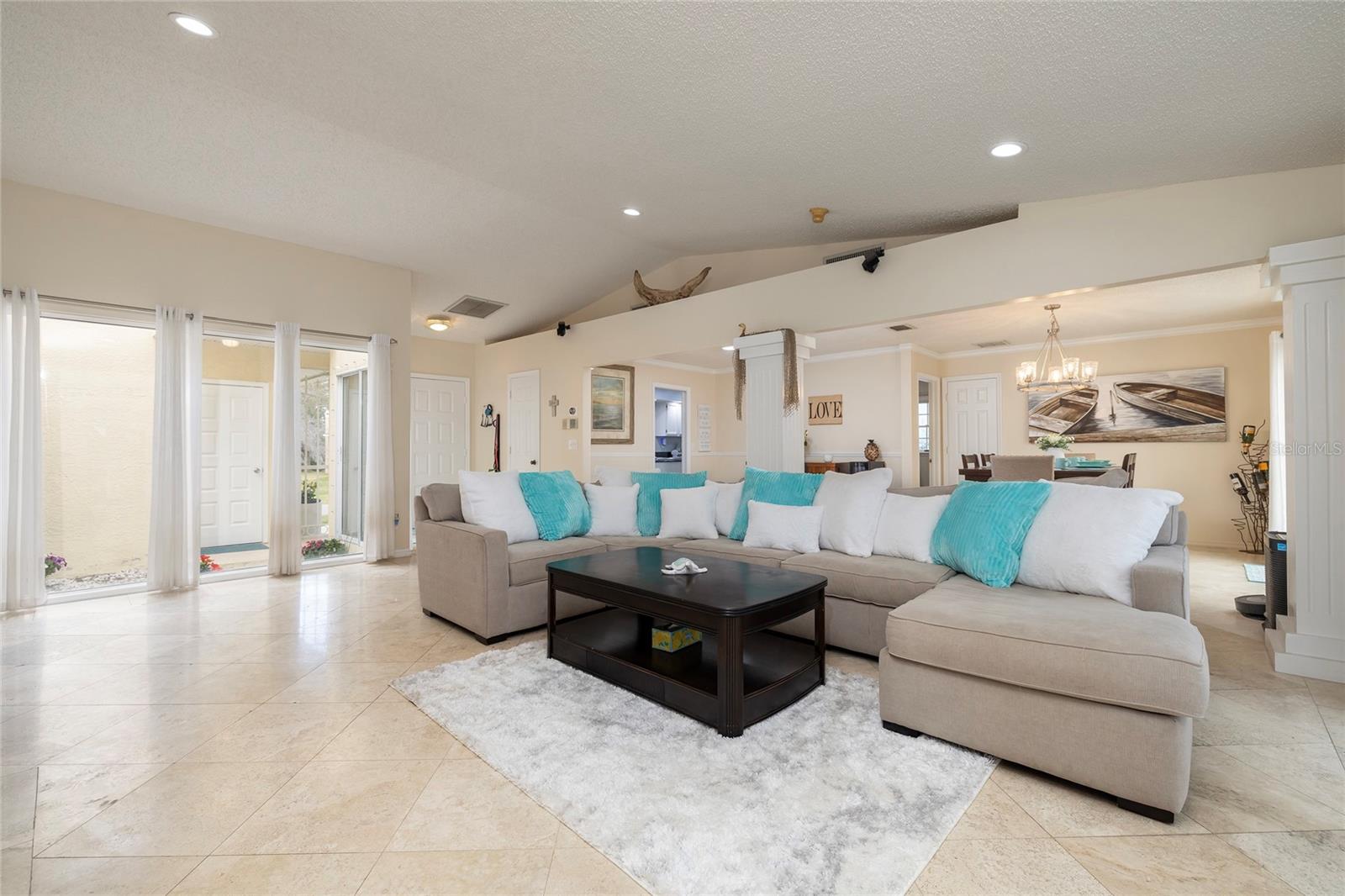 Large Living Room - open floorplan with views overlooking the pool and Intracoastal