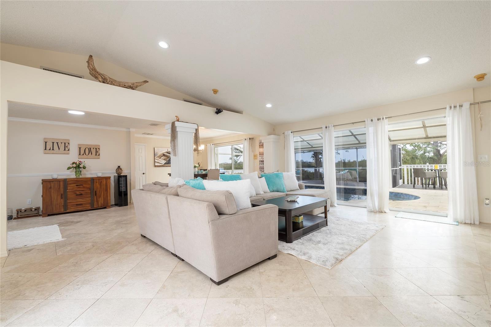 Large Living Room - open floorplan with views overlooking the pool and Intracoastal