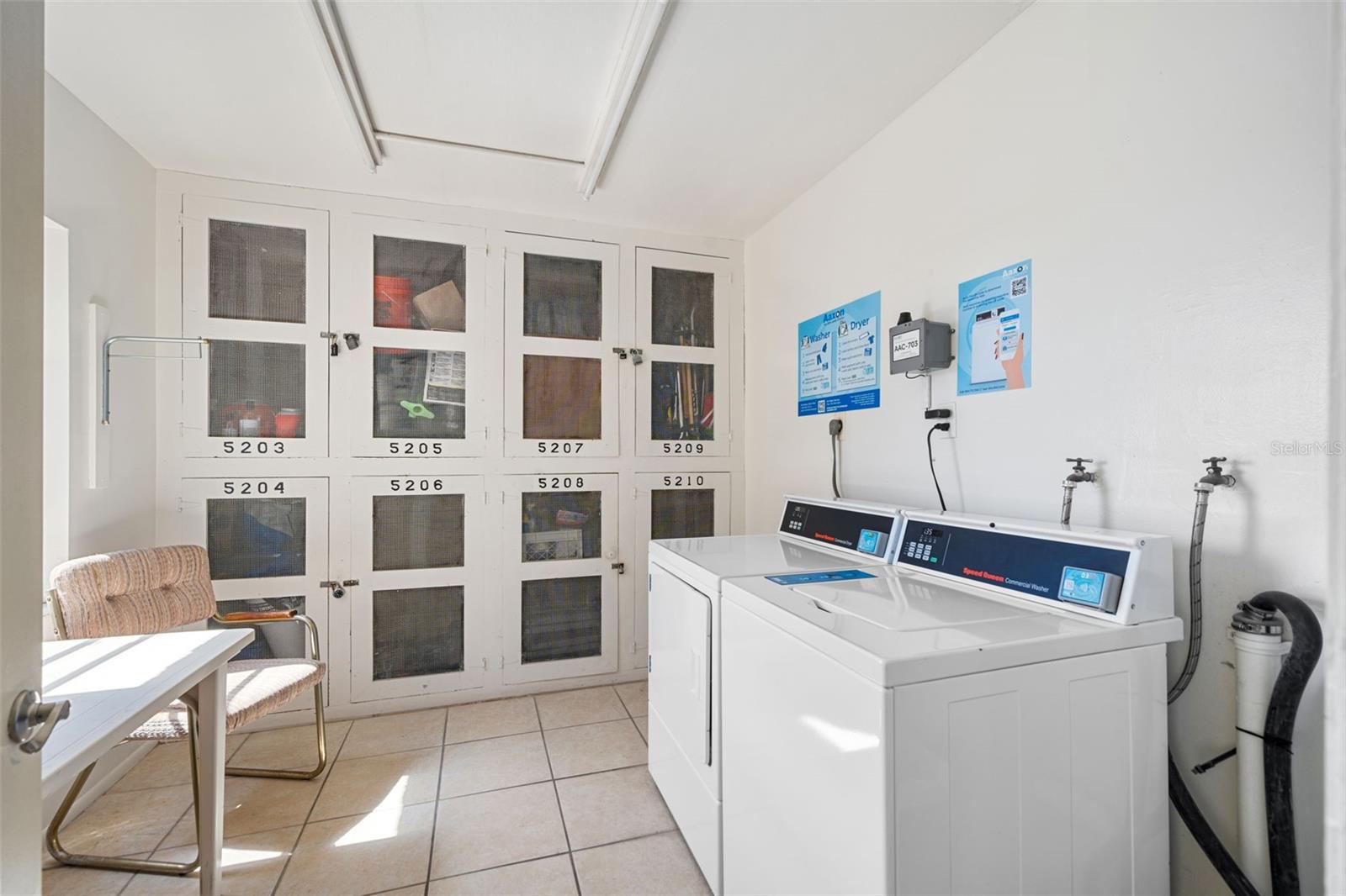 Clean laundry room and storage lockers