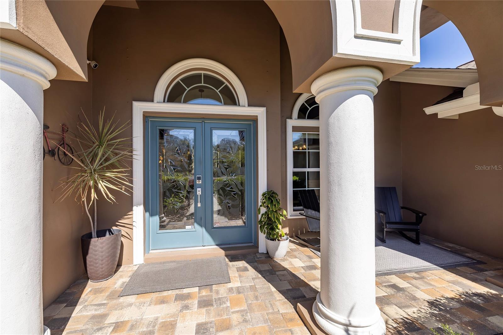 Double front door with beautiful etched glass