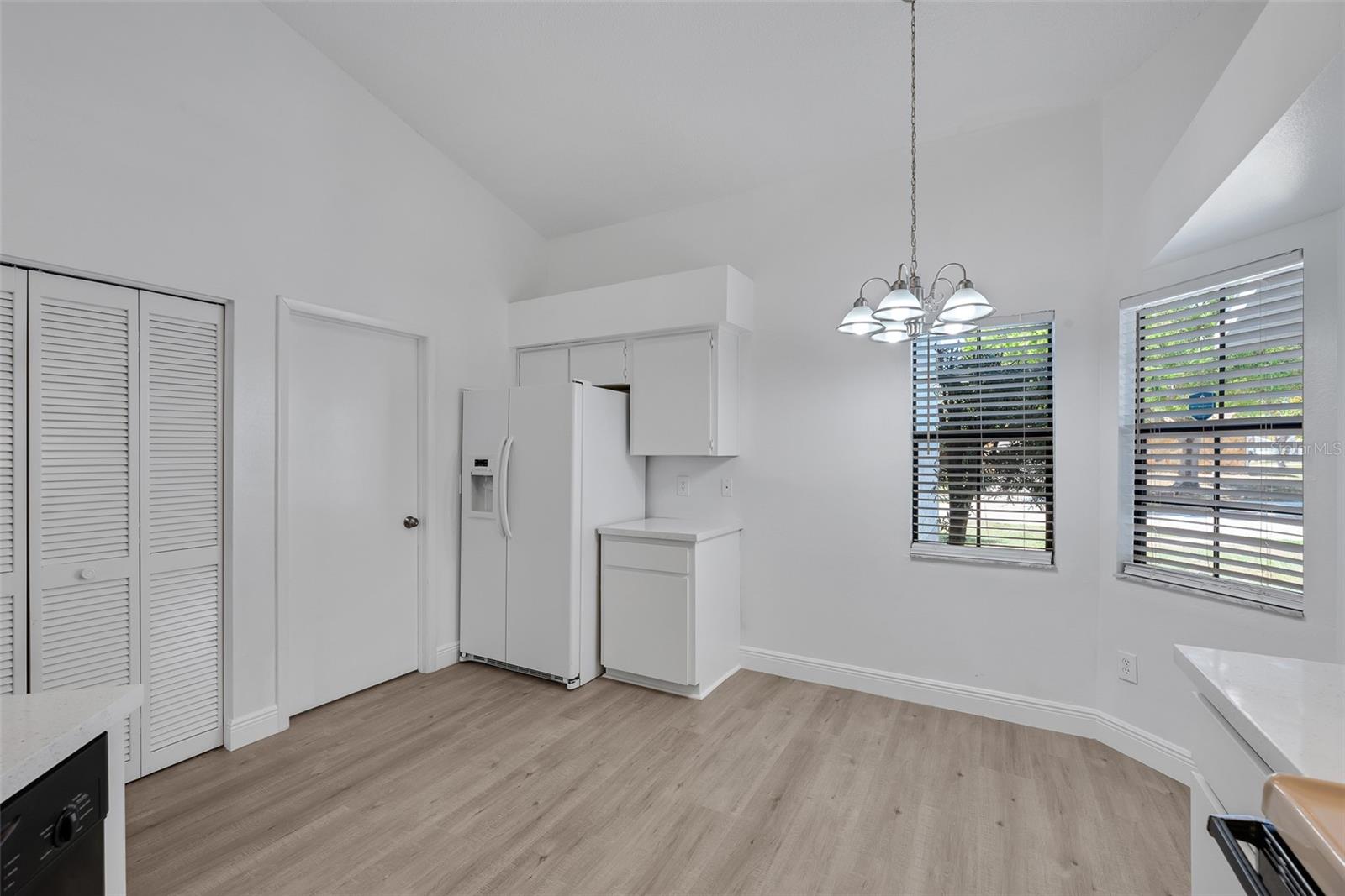 Kitchen to Inside Utility Room and Pantry Closet