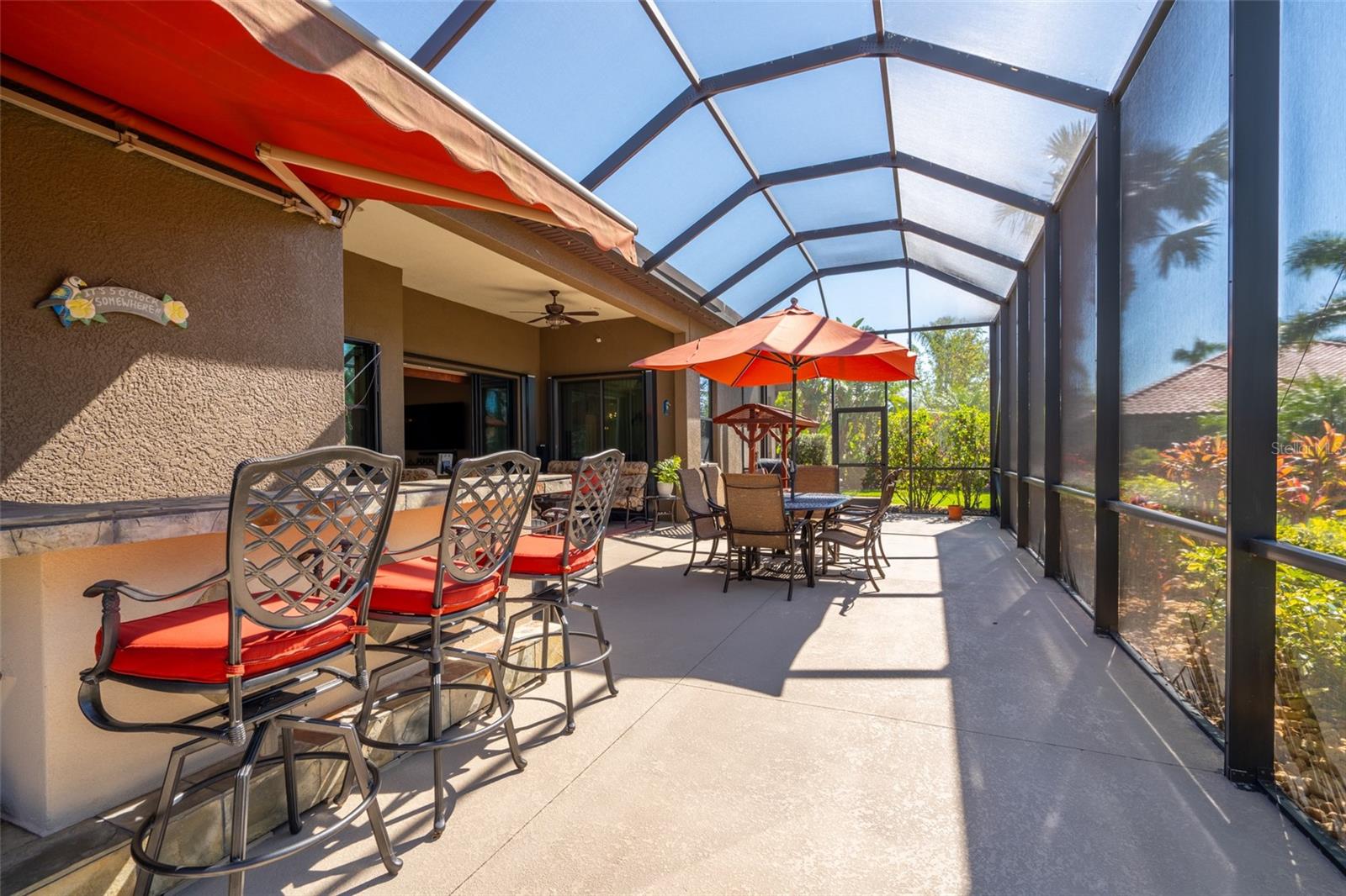 NOTICE THE ATTACHED AWNING OVER OUTDOOR BAR