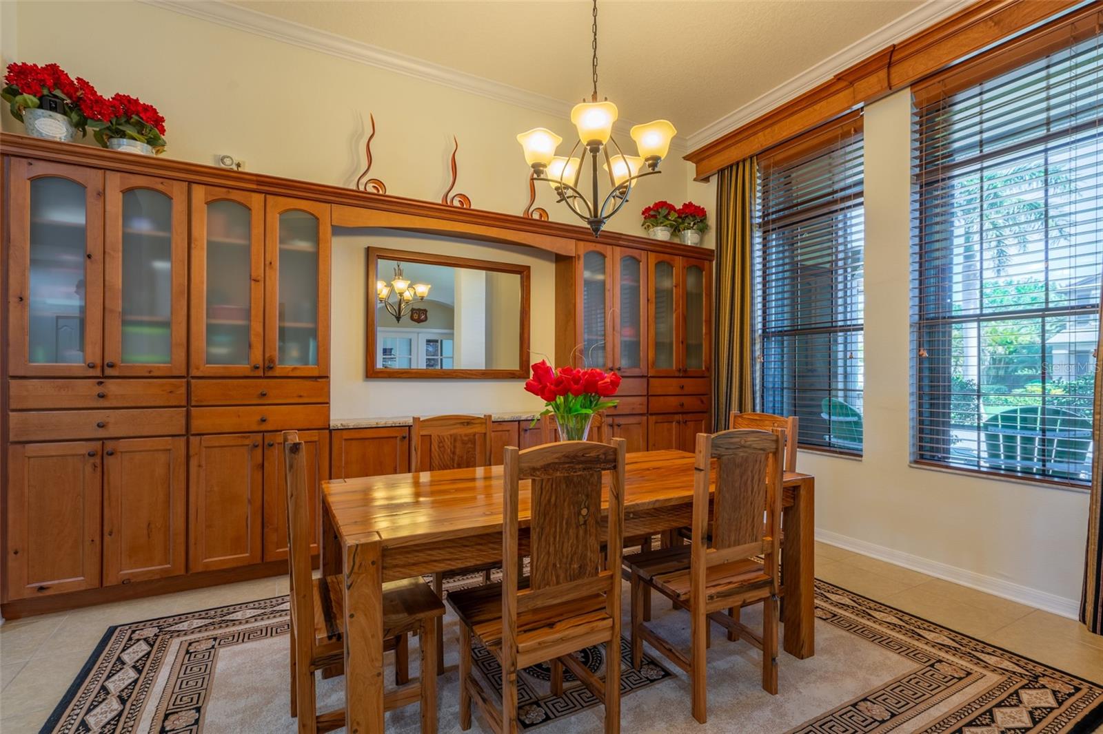 DINING ROOM CUSTOM CABINETS ARE BUILT-IN