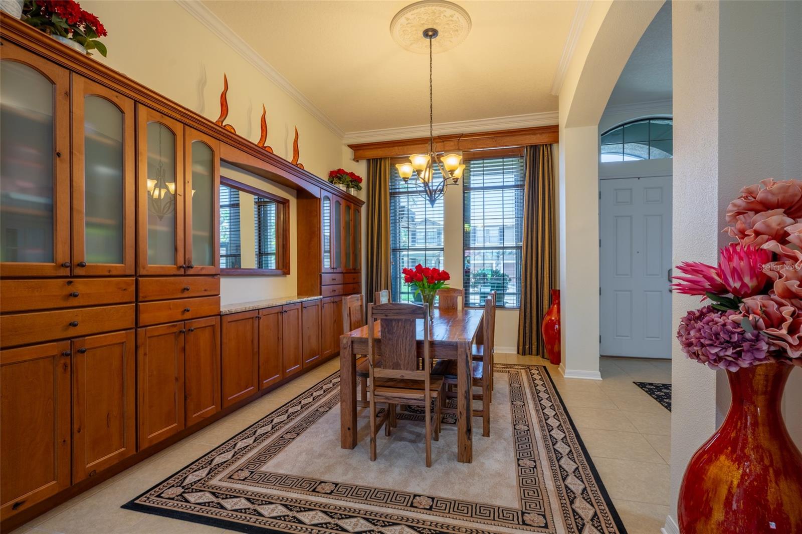 WINDOWS IN DINING ROOM OFFER PLENTY OF NATURAL LIGHT