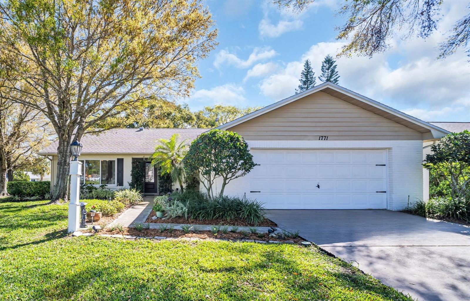 BRAND new roof prior to closing, updated windows, & safely in a non-flood zone~