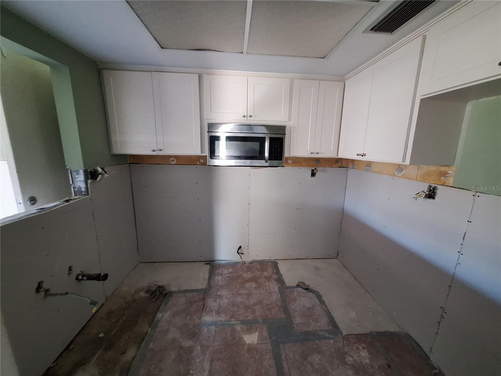 KITCHEN HAS A PASS THROUGH TO LIVING AREA