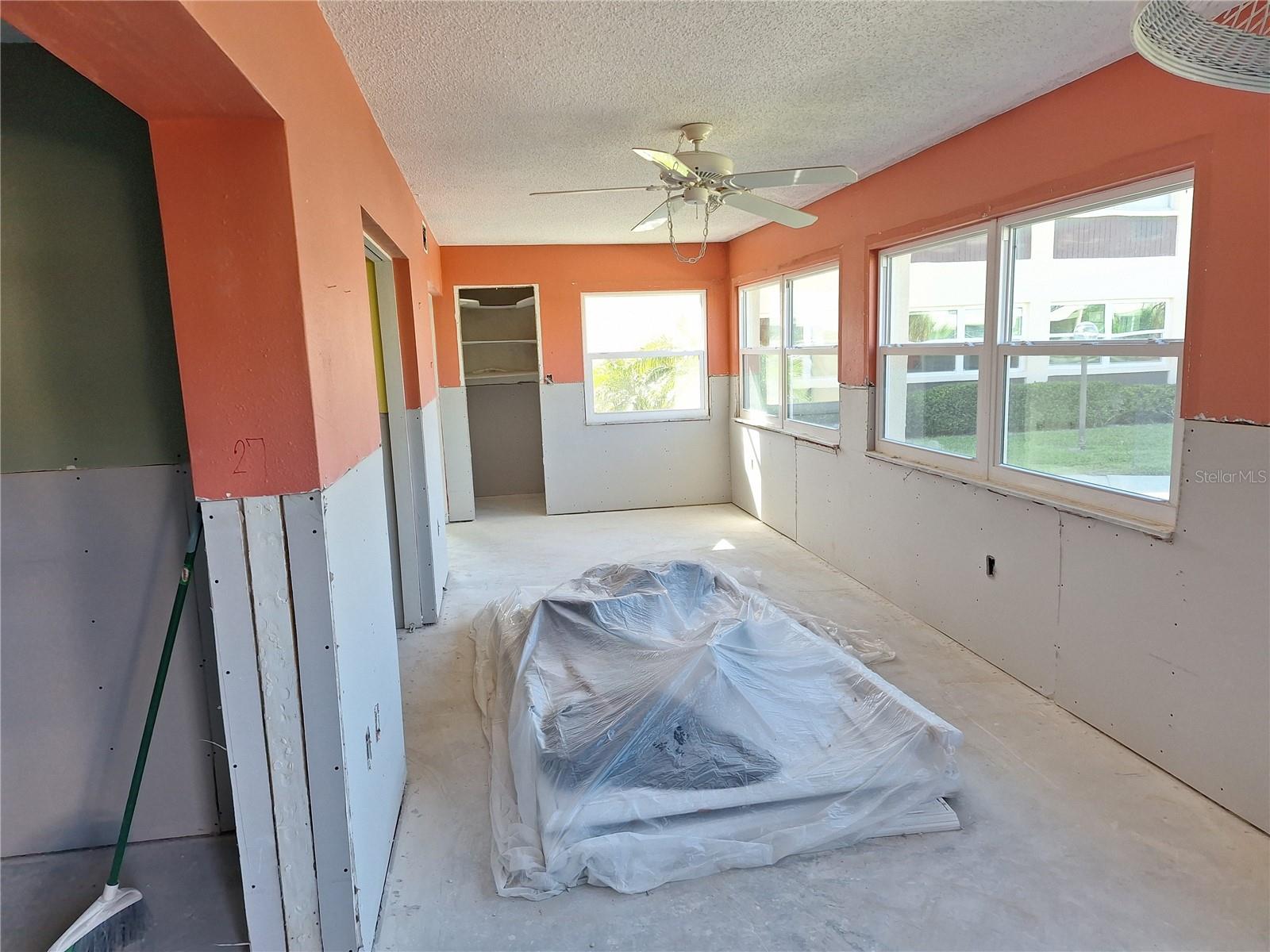 WOODEN SHUTTERS ARE SAVED TO BE REINSTALLED IN FLA ROOM