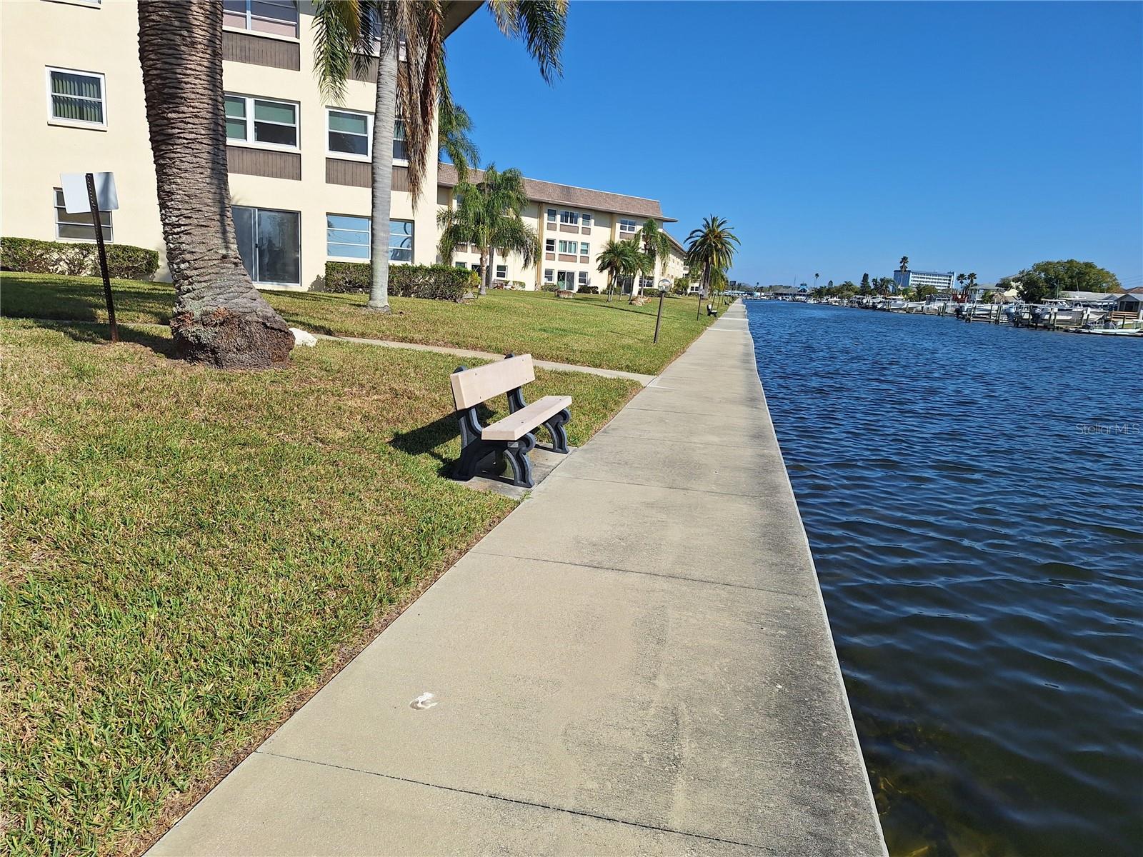 WALK FOR EVER OR READ A BOOK ON A WATERFRONT BENC