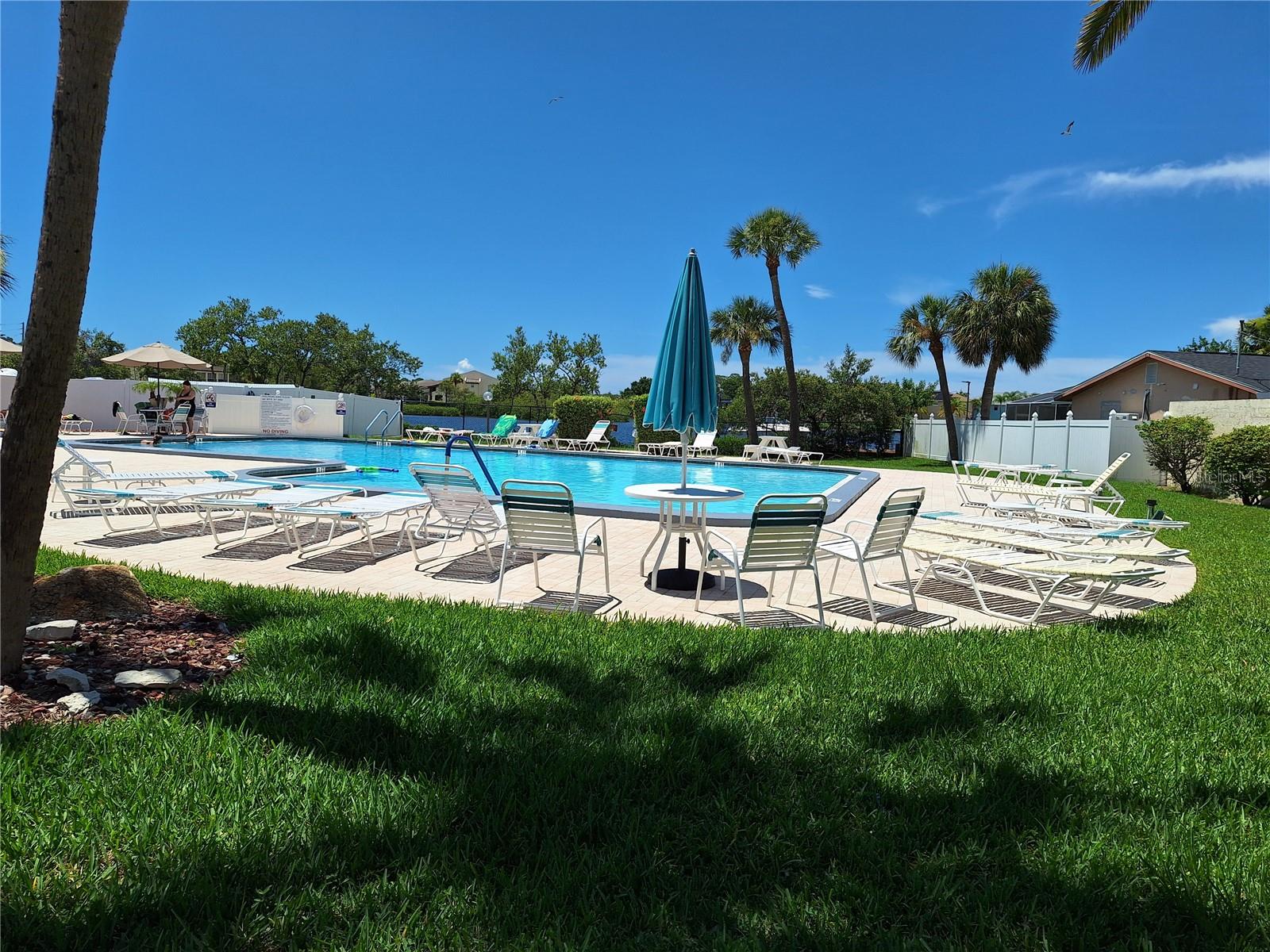 ONE OF THE 2 POOLS. THIS ONE IS WATERFRONT