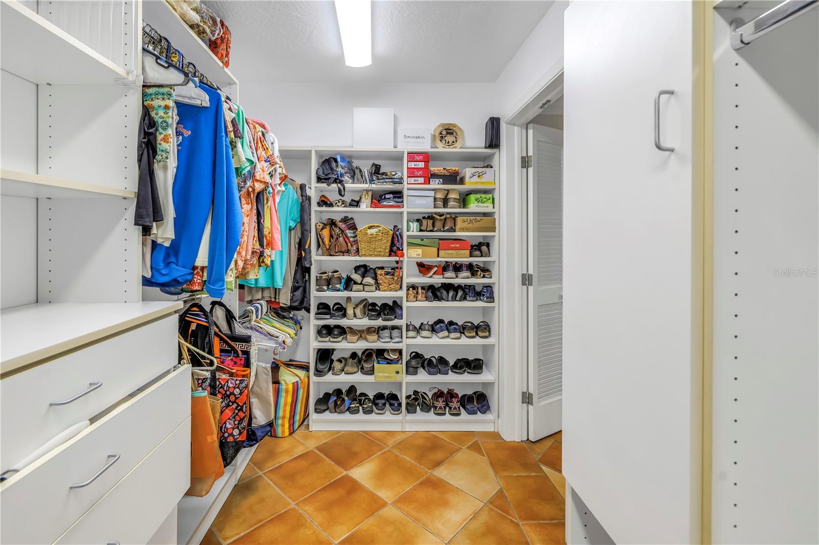 One of two walk-in closets.