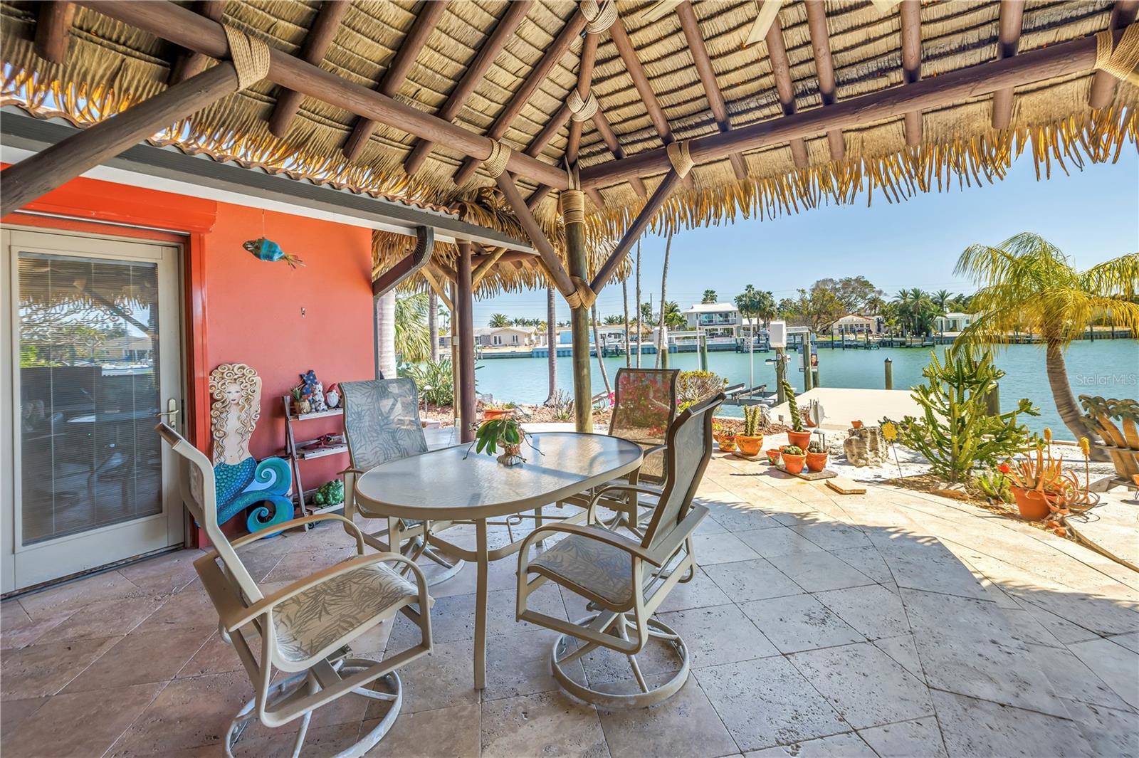 Tiki hut covered back patio.