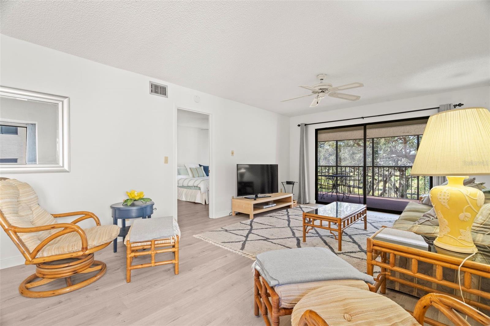 Family room with view of primary bedroom