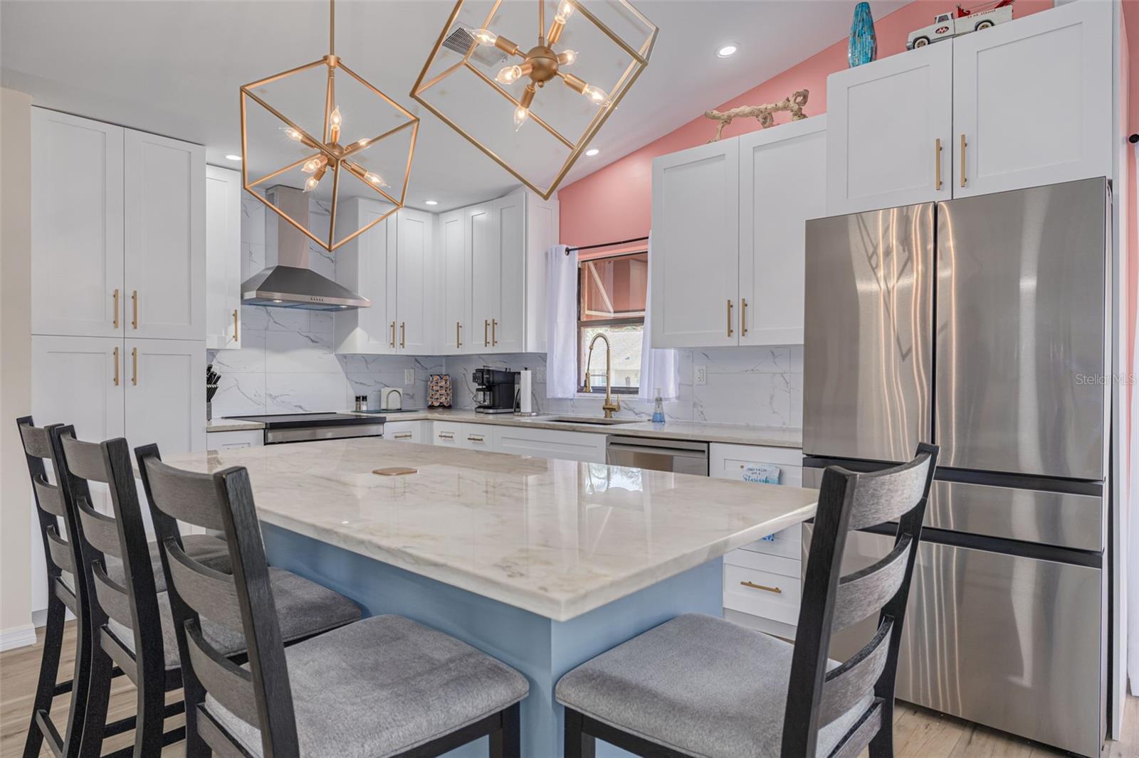 Updated kitchen with island and Samsung appliances