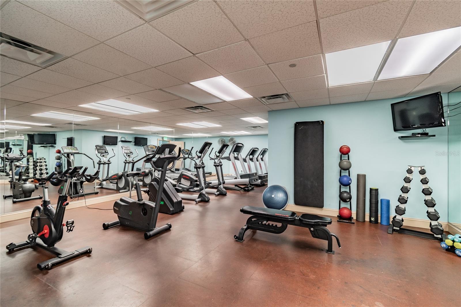 Fully equipped fitness center with modern exercise equipment.