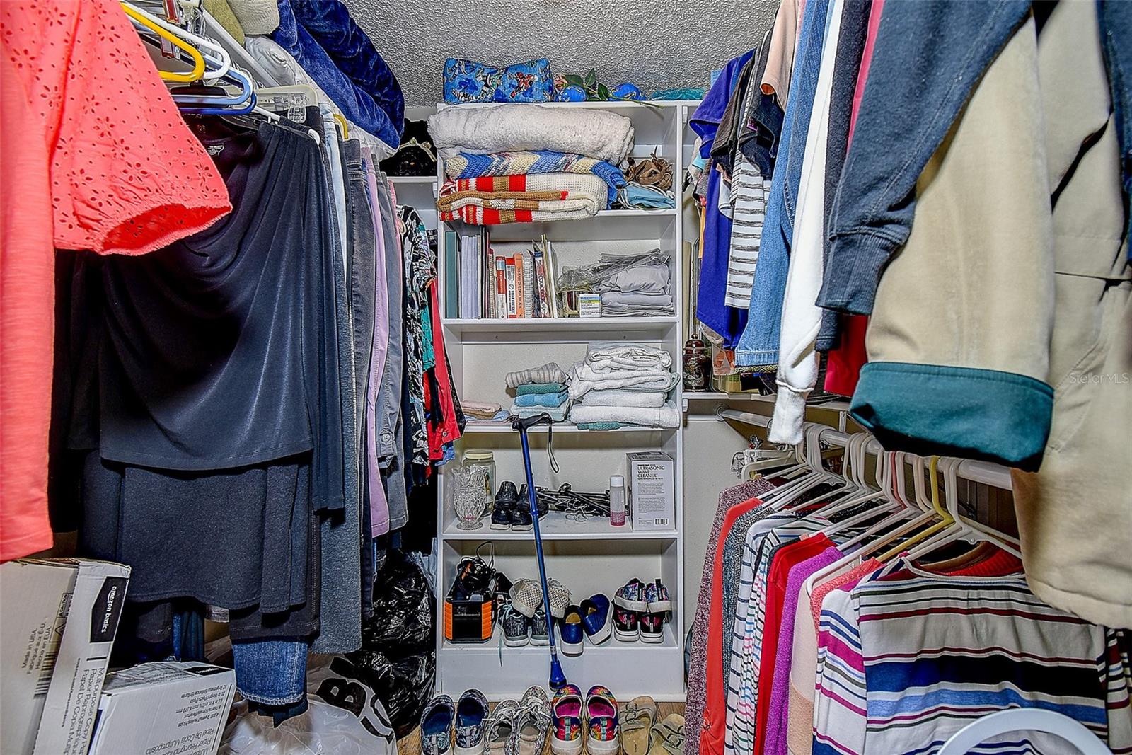 Walk in closet with organizers